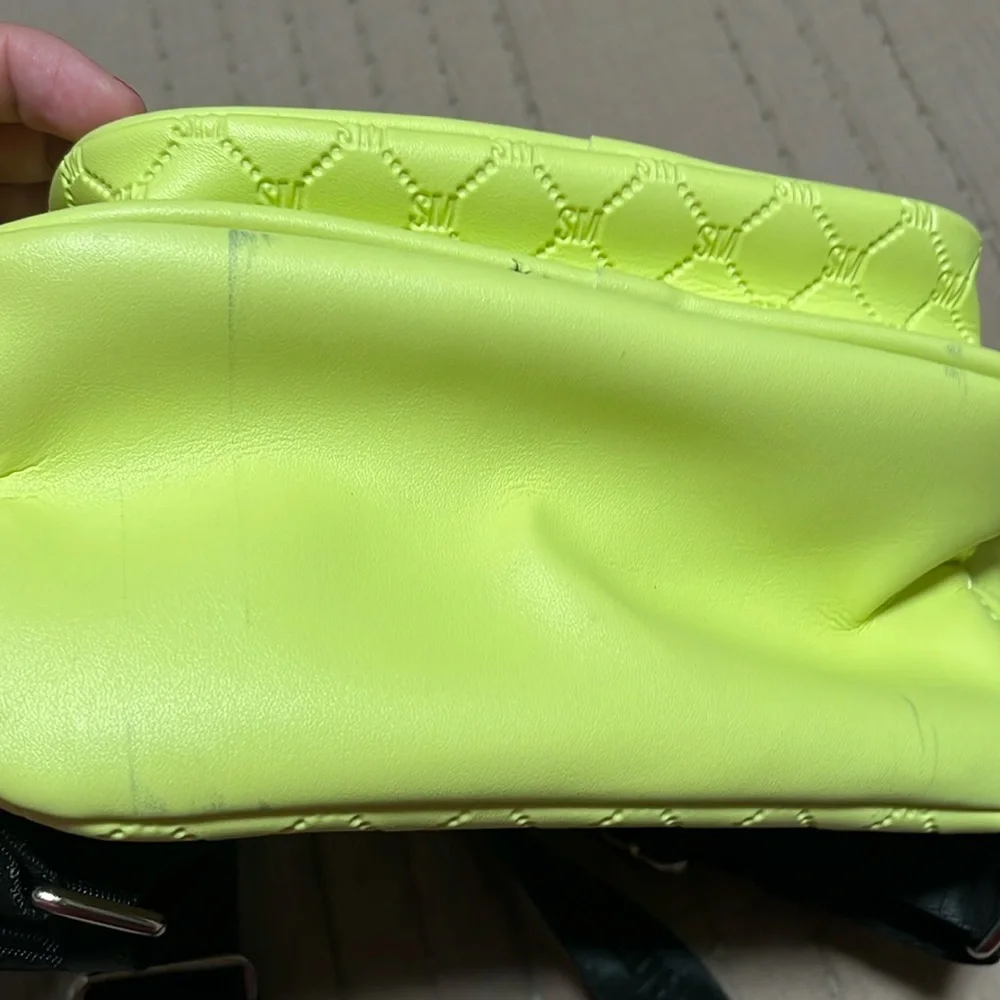 Steve madden neon backpack.